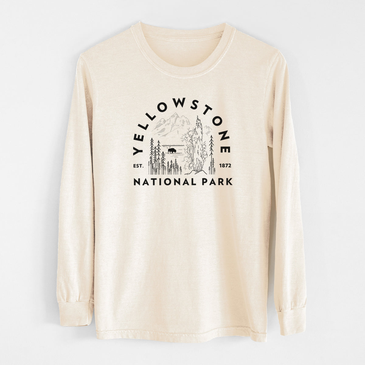 Ivory Comfort Colors long sleeve shirt laid flat, printed with a round badge of a waterfall, pine trees and a bison, with the words Yellowstone National Park, Est. 1872.