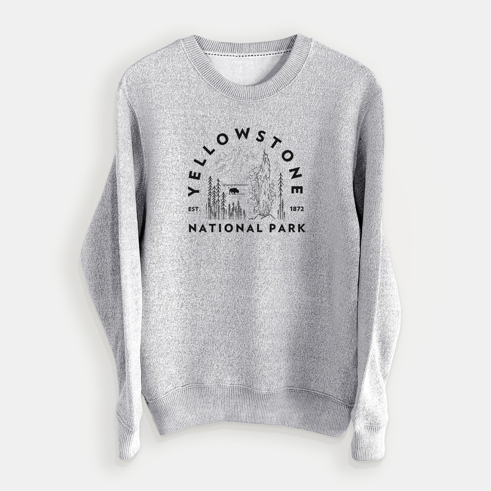 Salt and pepper knit sweatshirt laid flat, printed with a round badge of a waterfall, pine trees and a bison, with the words Yellowstone National Park, Est. 1872.