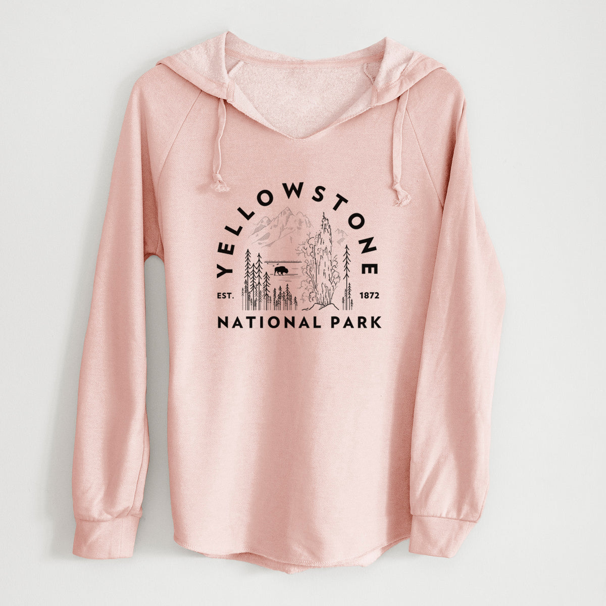 Blush pink women's Cali Wave hooded sweatshirt laid flat, printed with a round badge of a waterfall, pine trees and a bison, with the words Yellowstone National Park, Est. 1872.