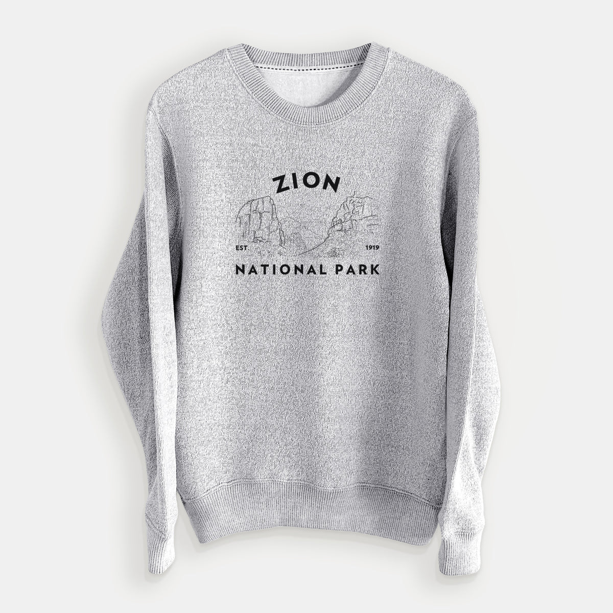 Salt and pepper knit sweatshirt laid flat, printed with a round badge of canyon walls, with the words Zion National Park, Est. 1919.