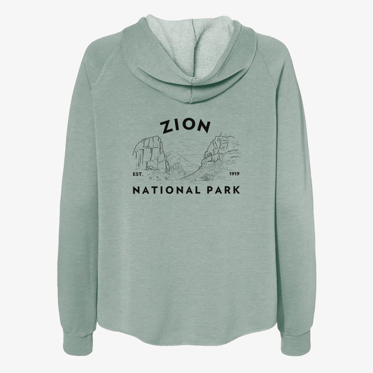 Sage green women's Cali Wave zip-up sweatshirt laid flat, printed with a round badge of canyon walls, with the words Zion National Park, Est. 1919.