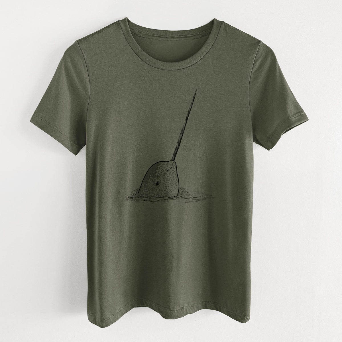 Military green women's relaxed fit cotton t-shirt laid flat, printed with a black ink illustration of a narwhal with its long spiral tusk pointing upward.