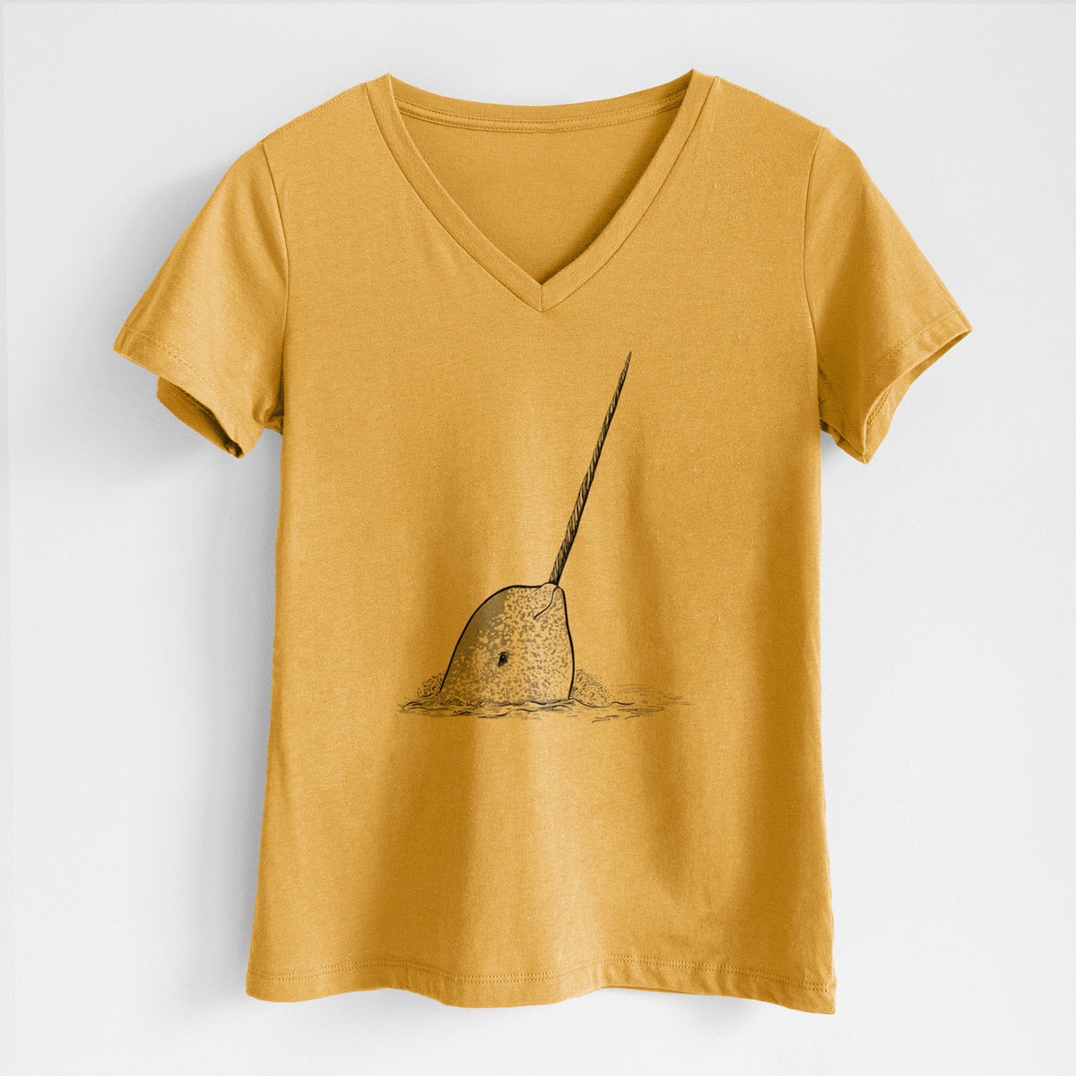 Honeycomb yellow women's relaxed fit cotton V-neck t-shirt laid flat, printed with a black ink illustration of a narwhal with its long spiral tusk pointing upward.
