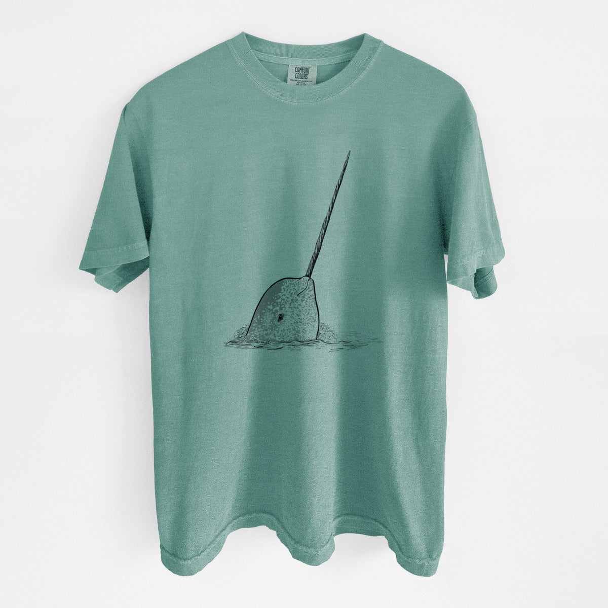 Reef green Comfort Colors t-shirt laid flat, printed with a black ink illustration of a narwhal with its long spiral tusk pointing upward.