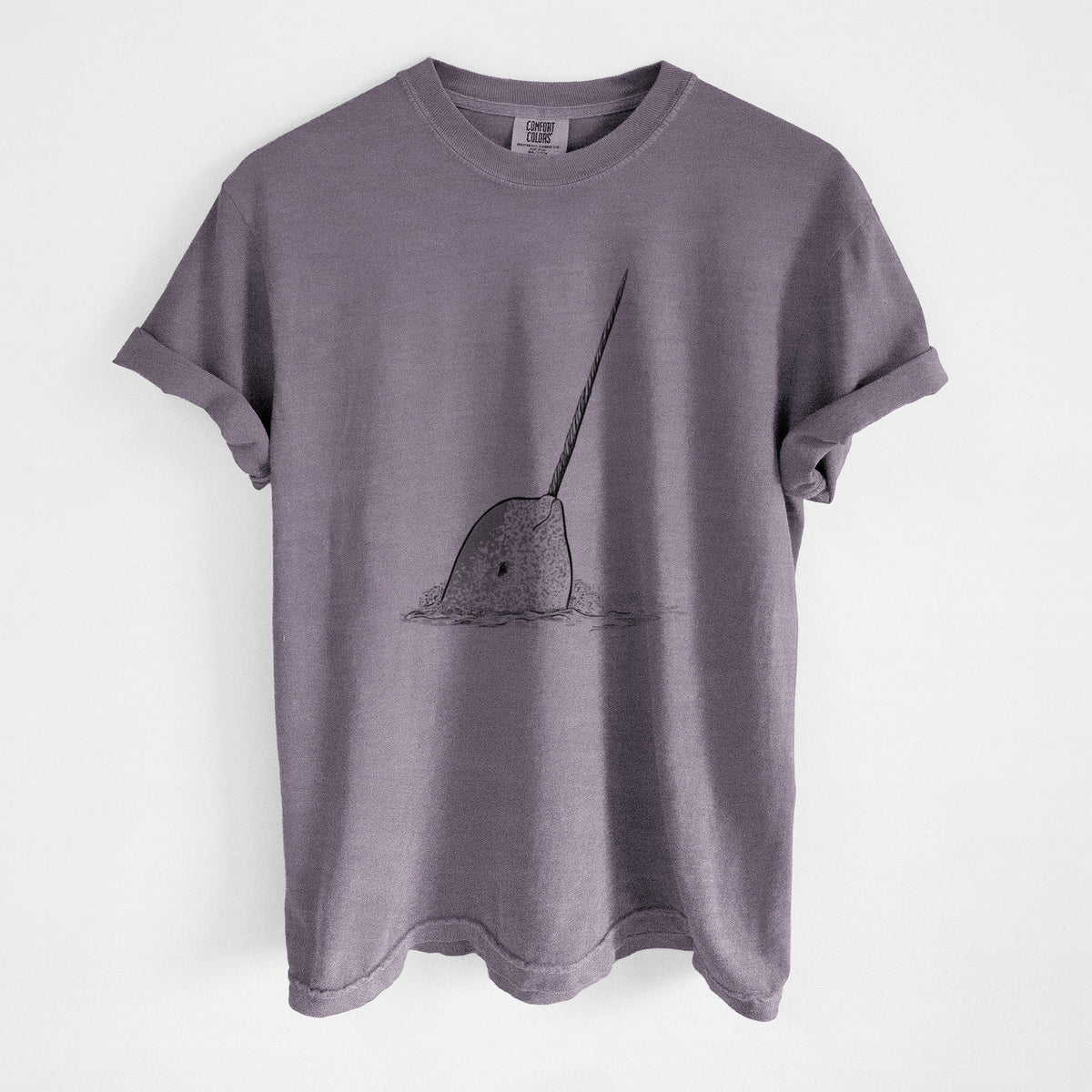 Wine red Comfort Colors t-shirt laid flat, printed with a black ink illustration of a narwhal with its long spiral tusk pointing upward.