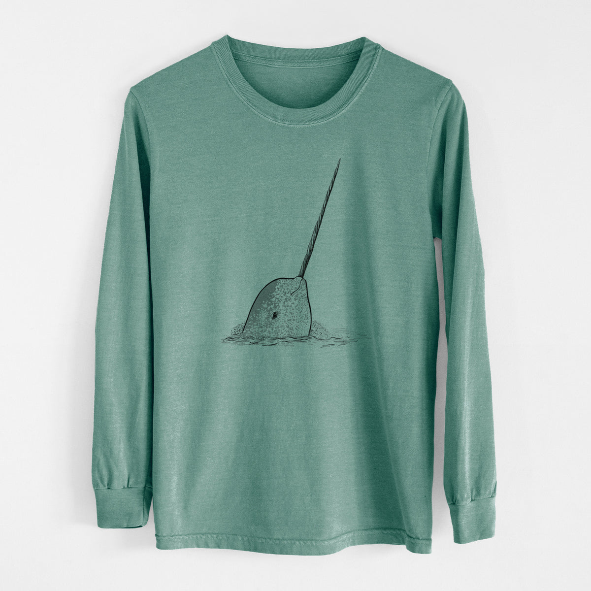 Pine green Comfort Colors long sleeve shirt laid flat, printed with a black ink illustration of a narwhal with its long spiral tusk pointing upward.