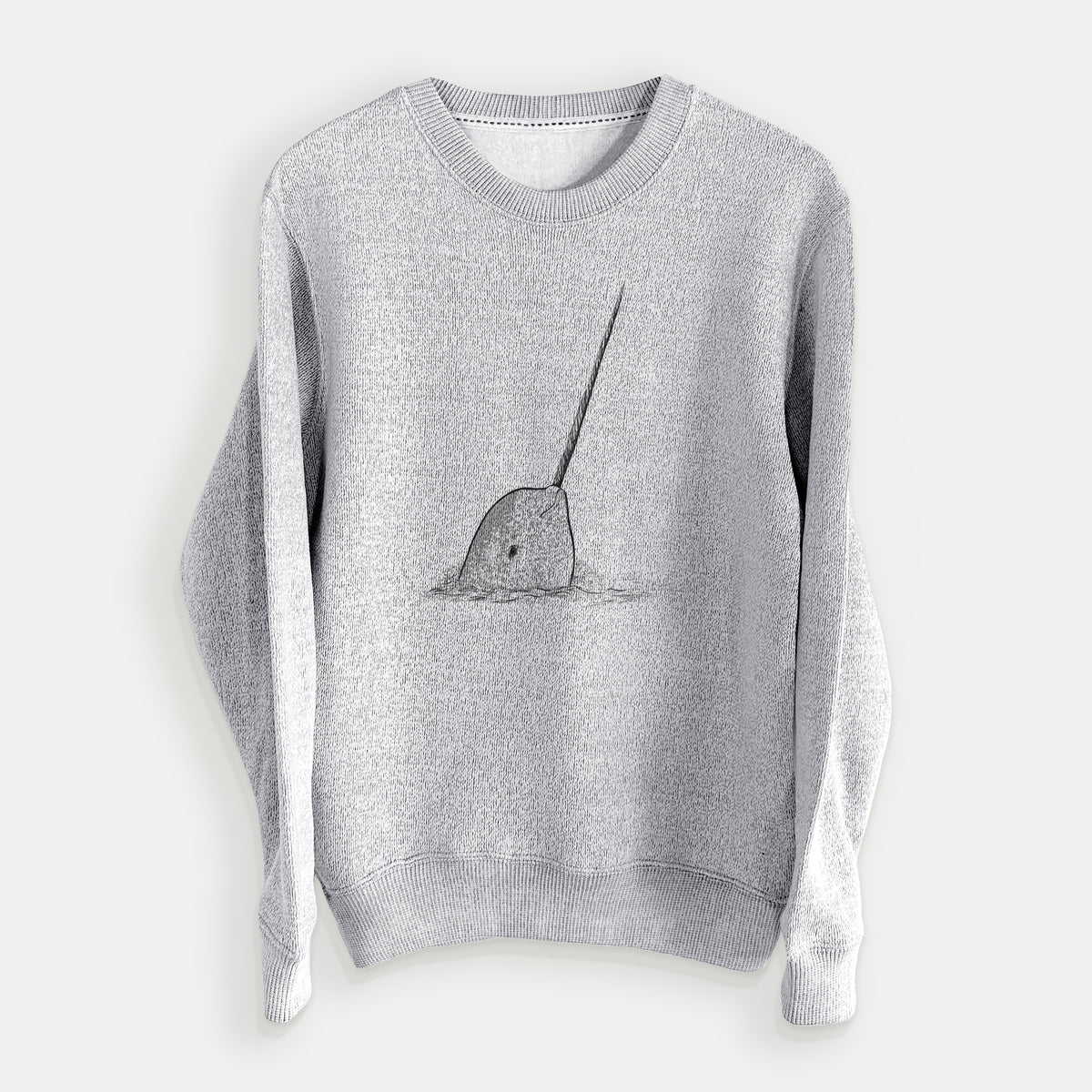 Salt and pepper knit sweatshirt laid flat, printed with a black ink illustration of a narwhal with its long spiral tusk pointing upward.