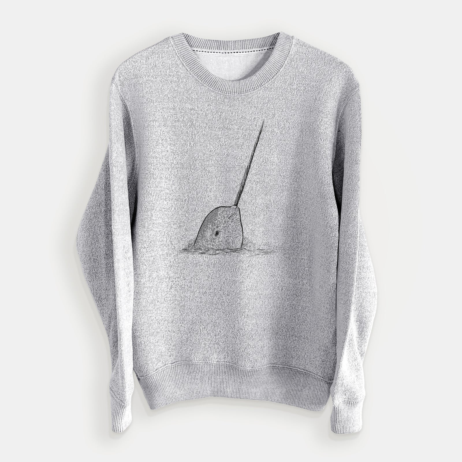 Salt and pepper knit sweatshirt laid flat, printed with a black ink illustration of a narwhal with its long spiral tusk pointing upward.