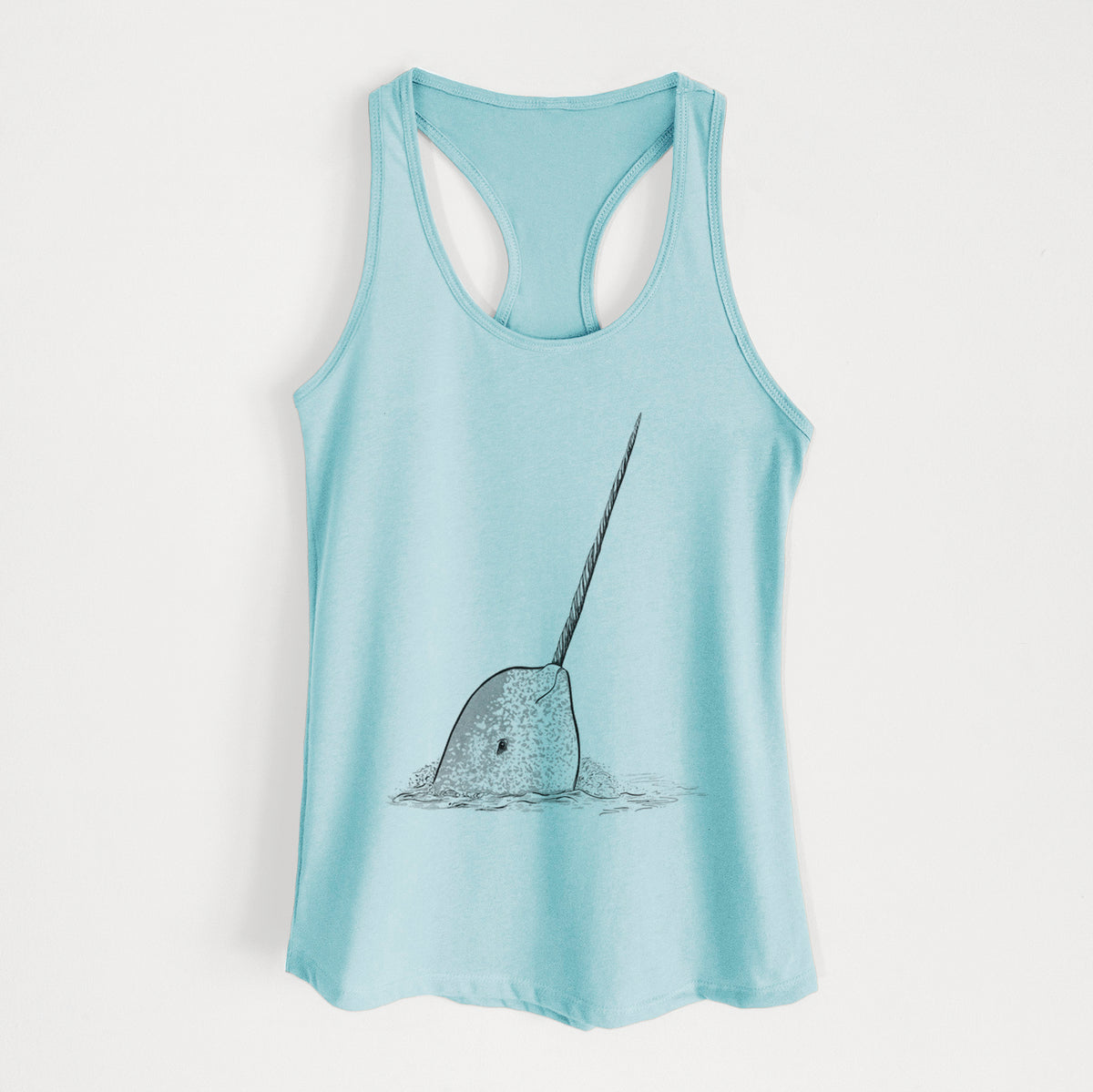 Cancun blue women's racerback tank top laid flat, printed with a black ink illustration of a narwhal with its long spiral tusk pointing upward.