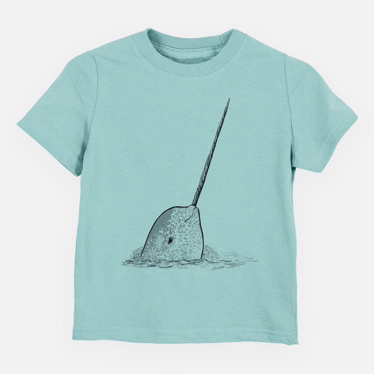Saltwater toddler t-shirt laid flat, printed with a black ink illustration of a narwhal with its long spiral tusk pointing upward.