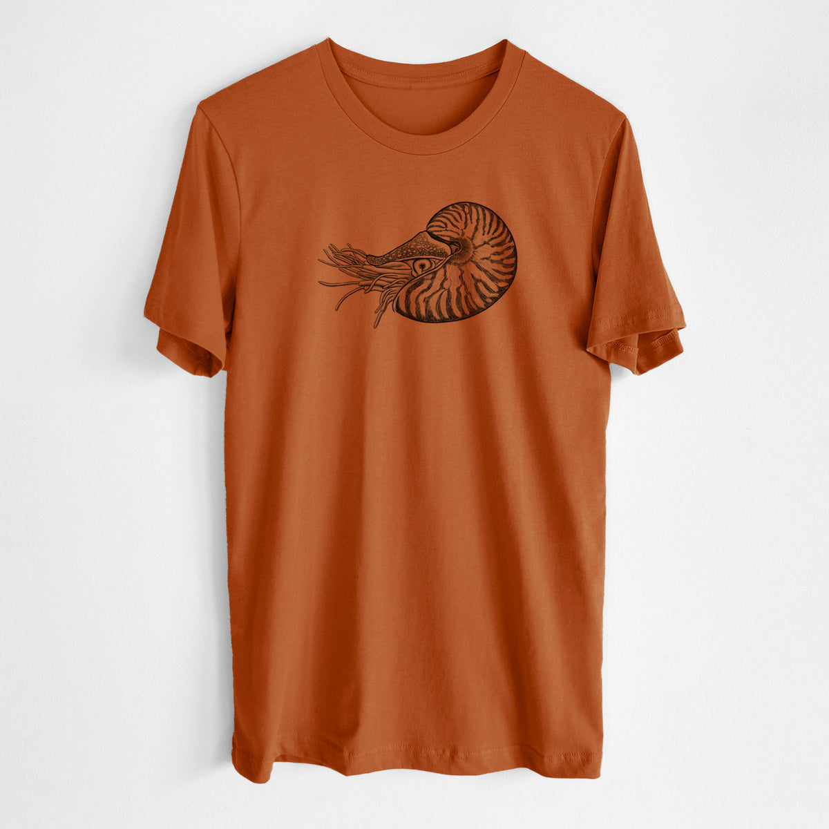 Autumn lightweight cotton t-shirt laid flat, printed with a detailed black ink illustration of a chambered nautilus with its striped spiral shell and tentacles.