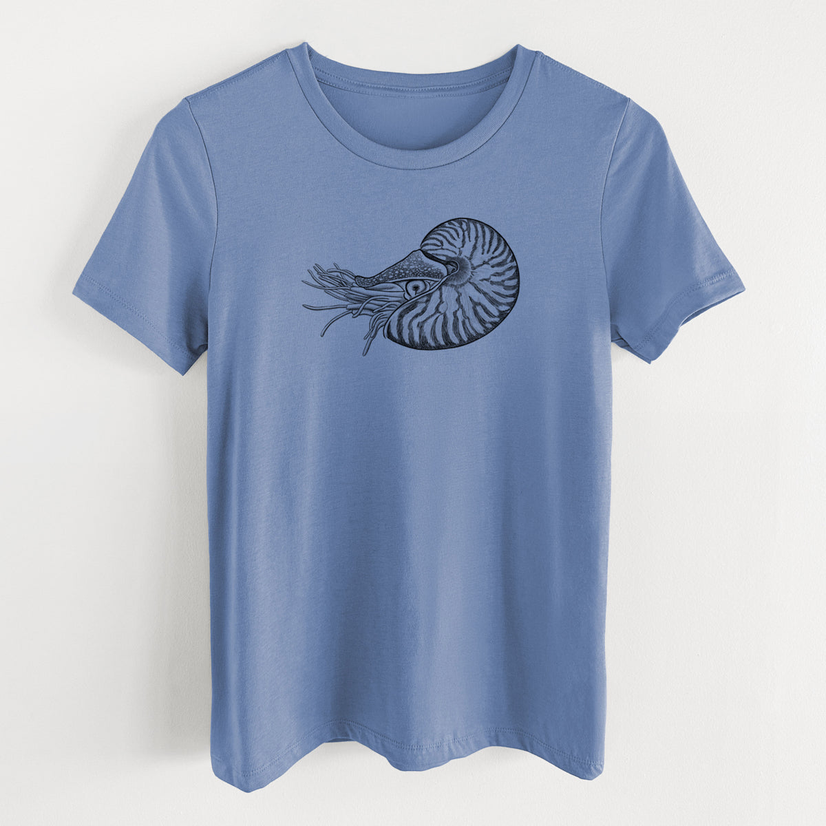 Blue bell women's relaxed fit cotton t-shirt laid flat, printed with a detailed black ink illustration of a chambered nautilus with its striped spiral shell and tentacles.