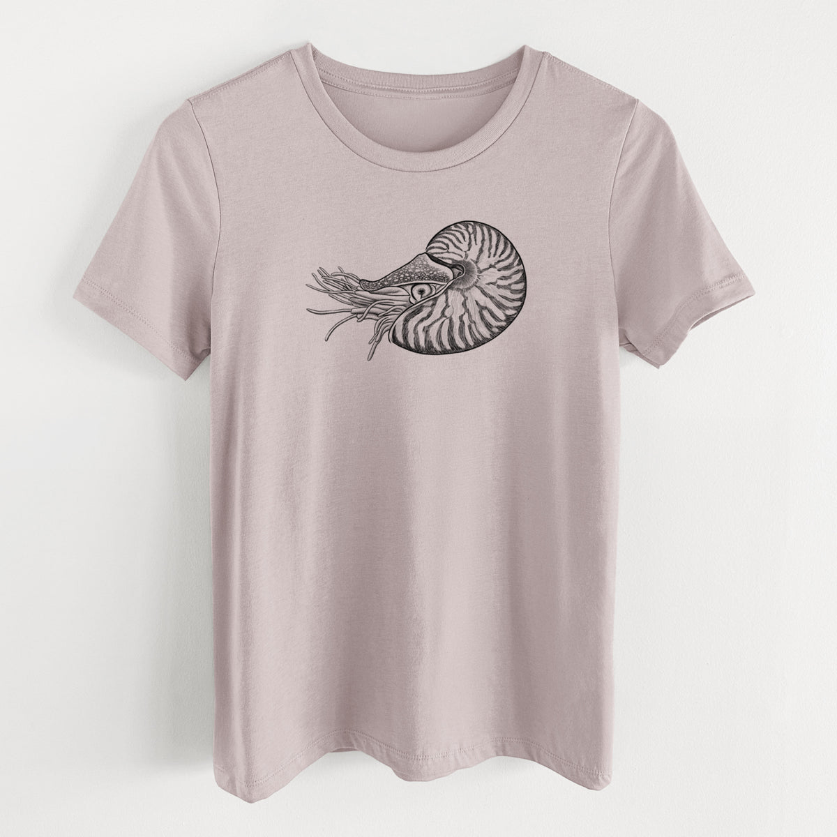 Pink gravel women's relaxed fit cotton t-shirt laid flat, printed with a detailed black ink illustration of a chambered nautilus with its striped spiral shell and tentacles.