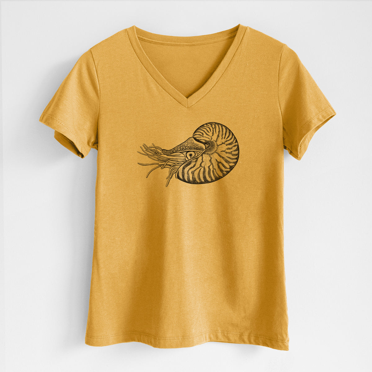Honeycomb yellow women's relaxed fit cotton V-neck t-shirt laid flat, printed with a detailed black ink illustration of a chambered nautilus with its striped spiral shell and tentacles.