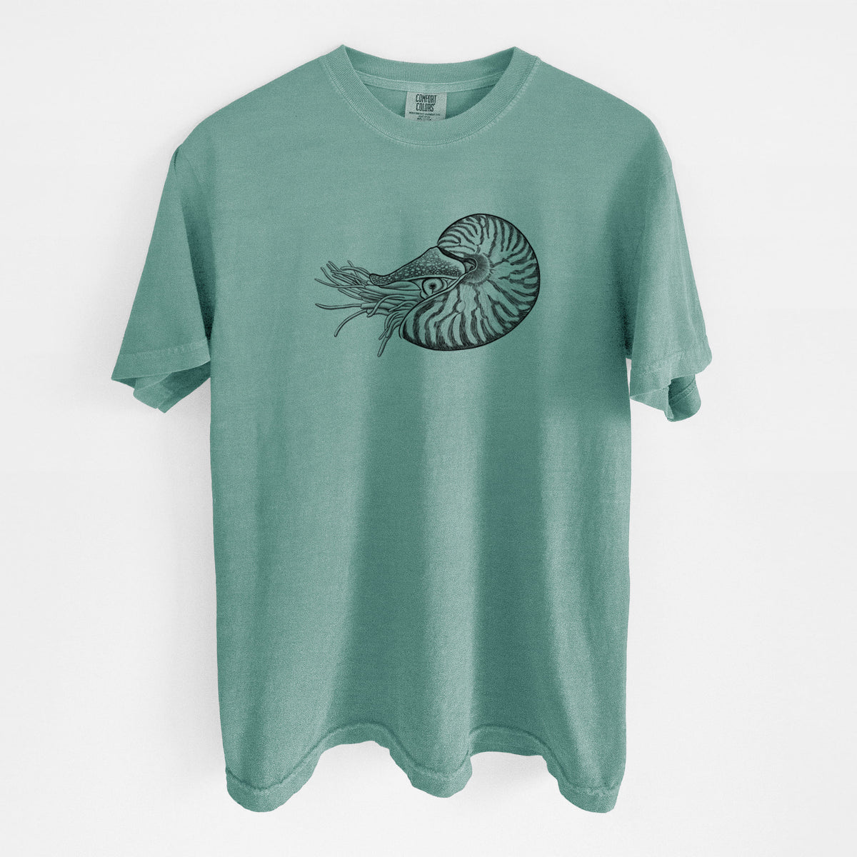 Reef green Comfort Colors t-shirt laid flat, printed with a detailed black ink illustration of a chambered nautilus with its striped spiral shell and tentacles.