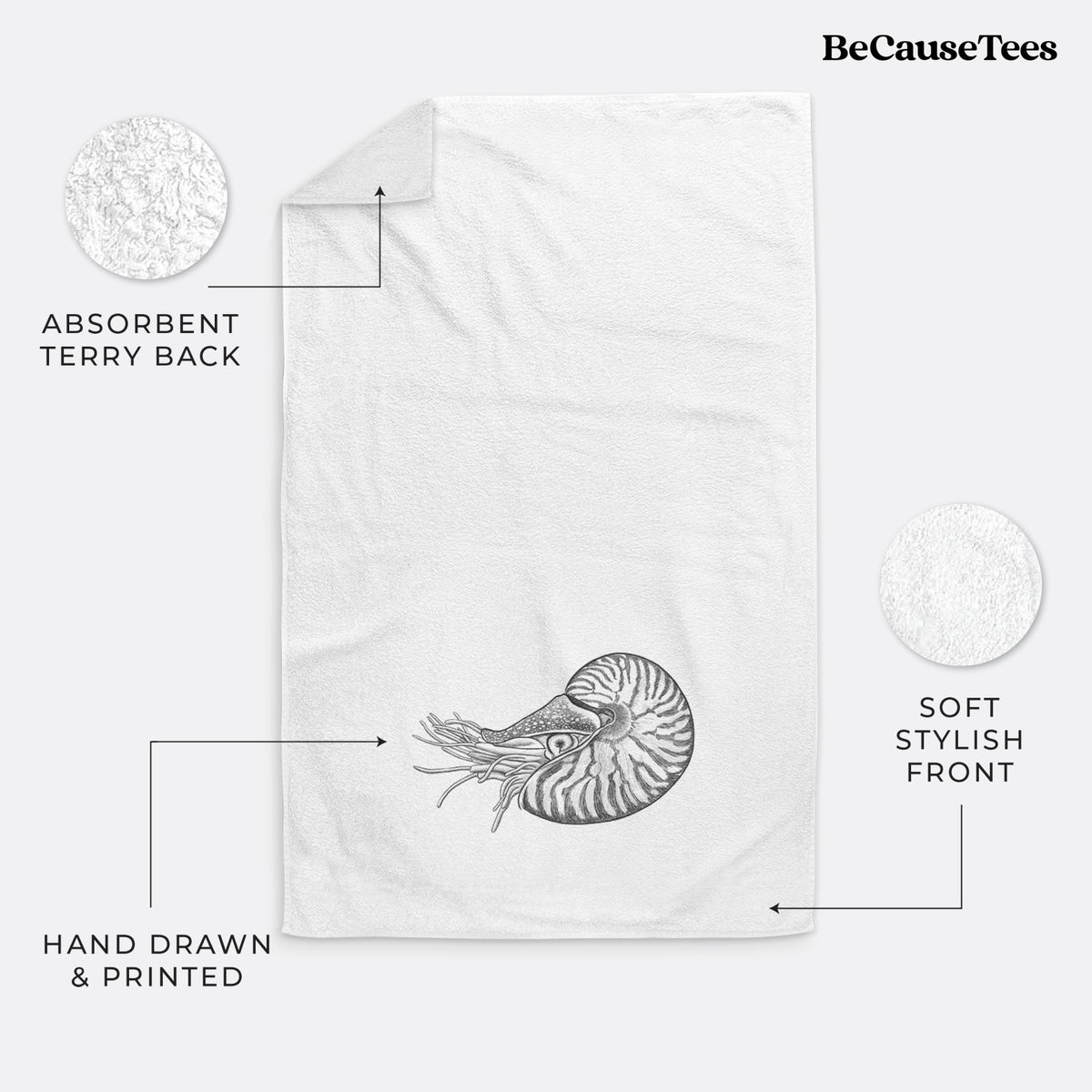 White hand towel printed with a detailed black ink illustration of a chambered nautilus with its striped spiral shell and tentacles.
