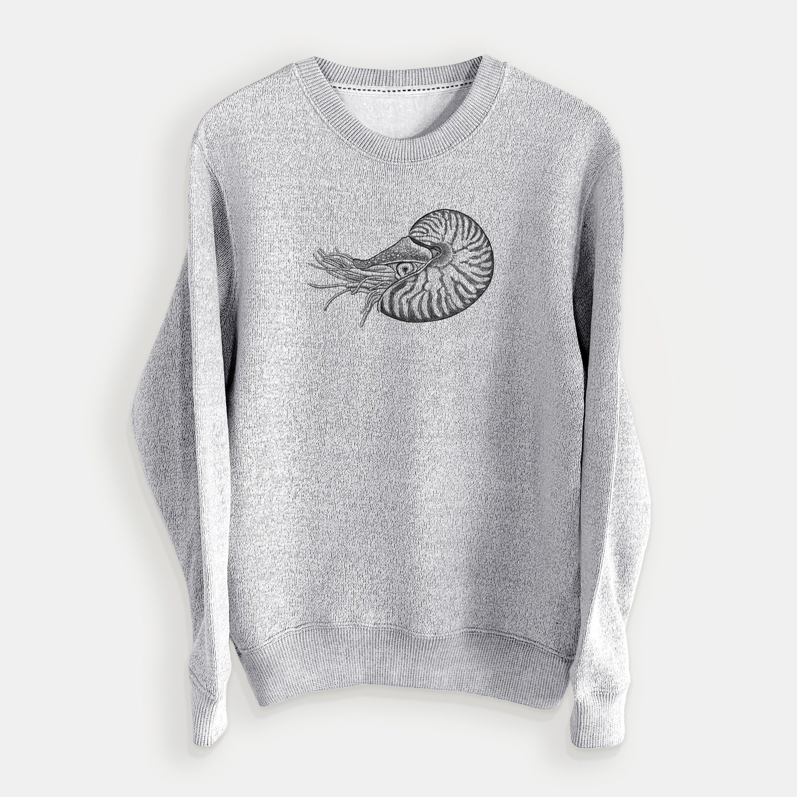 Salt and pepper knit sweatshirt laid flat, printed with a detailed black ink illustration of a chambered nautilus with its striped spiral shell and tentacles.