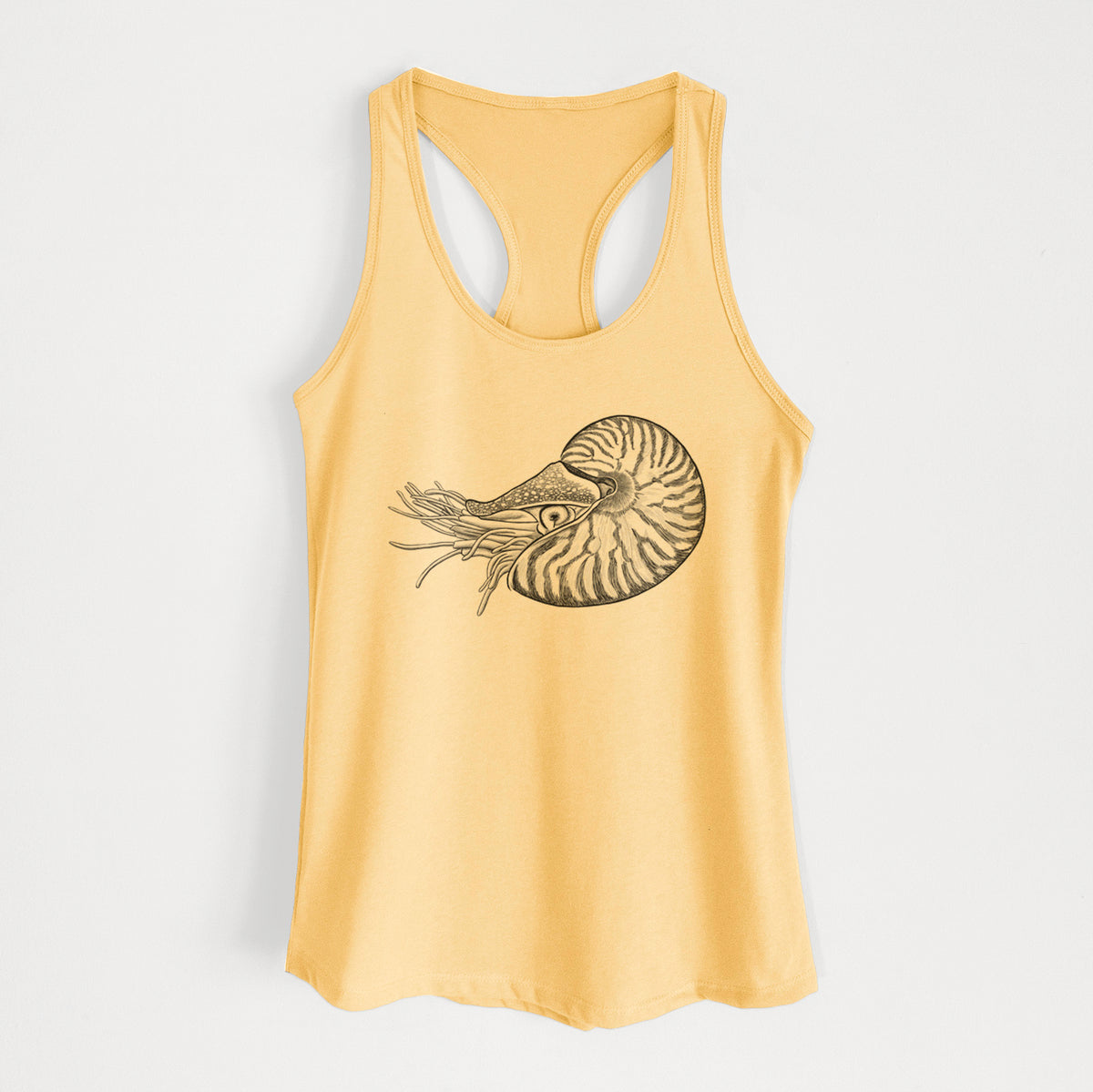 Banana cream women's racerback tank top laid flat, printed with a detailed black ink illustration of a chambered nautilus with its striped spiral shell and tentacles.
