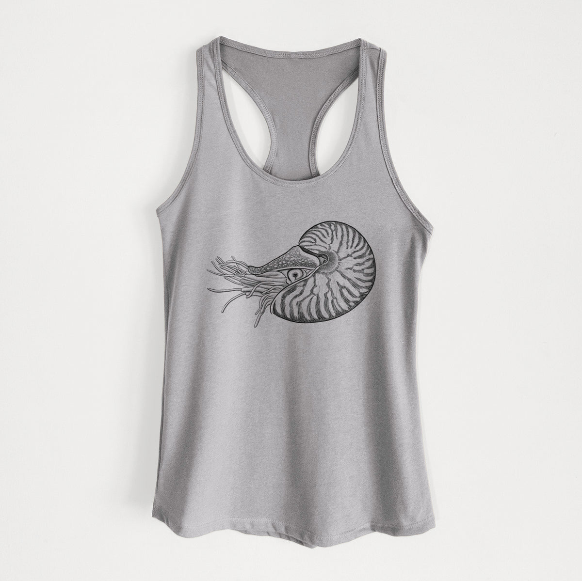 Heather grey women's racerback tank top laid flat, printed with a detailed black ink illustration of a chambered nautilus with its striped spiral shell and tentacles.