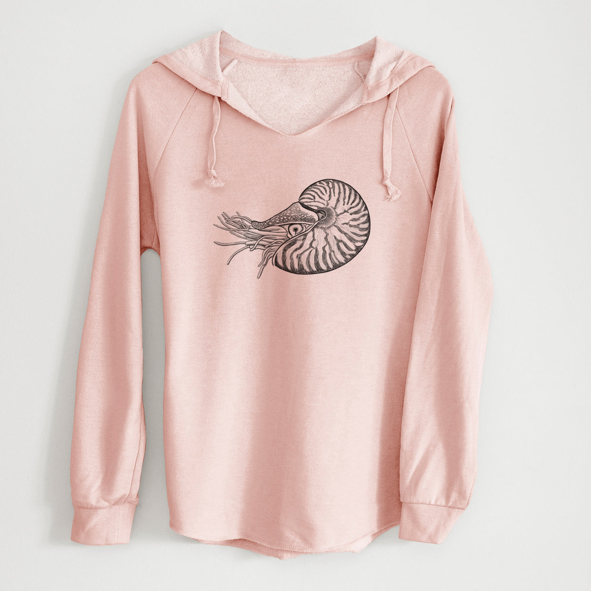 Blush pink women's Cali Wave hooded sweatshirt laid flat, printed with a detailed black ink illustration of a chambered nautilus with its striped spiral shell and tentacles.