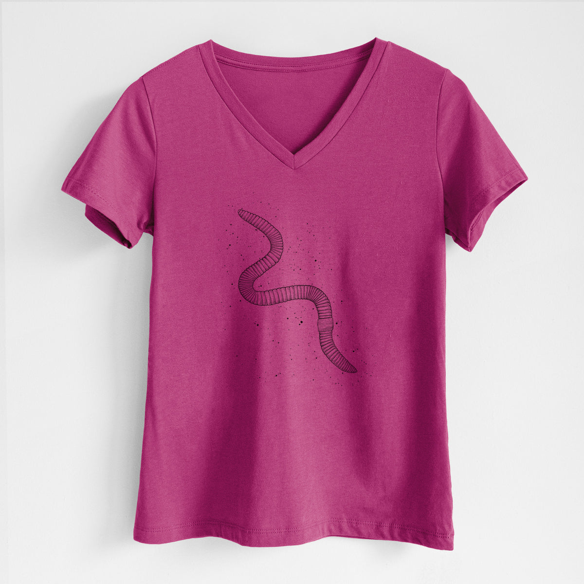 Berry pink women's relaxed fit cotton V-neck t-shirt laid flat, printed with a black ink illustration of a nightcrawler earthworm with soil specks.