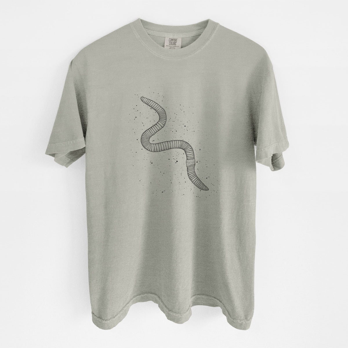 Sandstone beige Comfort Colors t-shirt laid flat, printed with a black ink illustration of a nightcrawler earthworm with soil specks.