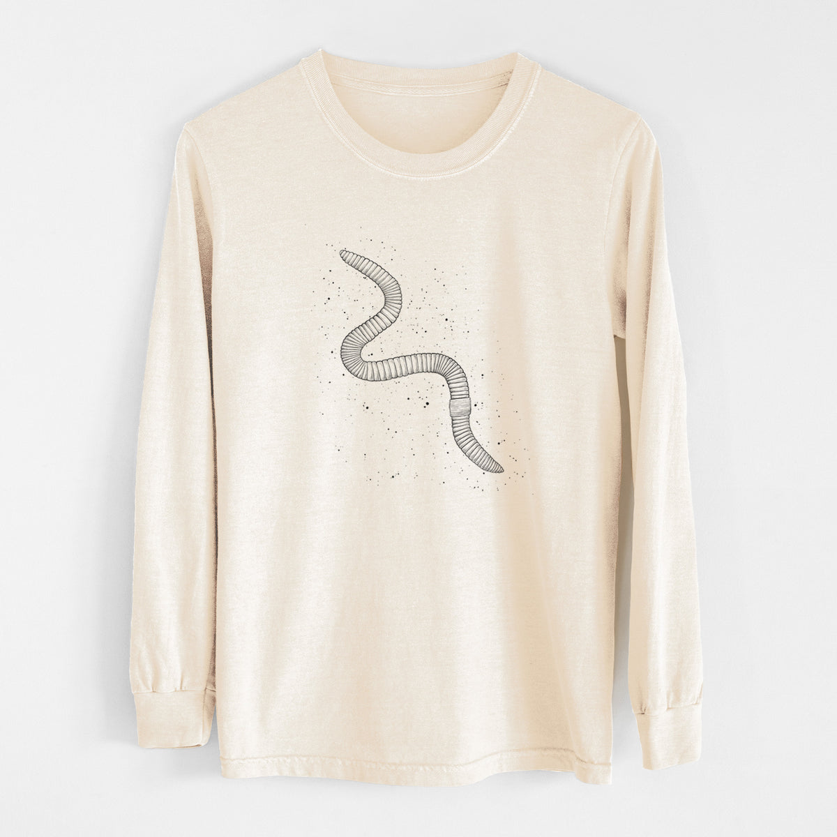 Ivory Comfort Colors long sleeve shirt laid flat, printed with a black ink illustration of a nightcrawler earthworm with soil specks.