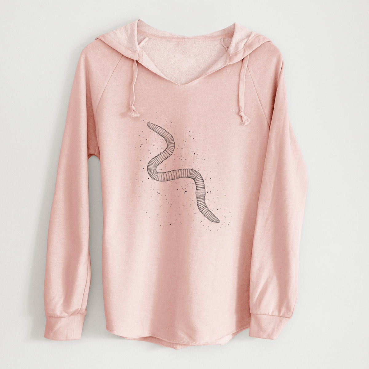 Blush pink women's Cali Wave hooded sweatshirt laid flat, printed with a black ink illustration of a nightcrawler earthworm with soil specks.