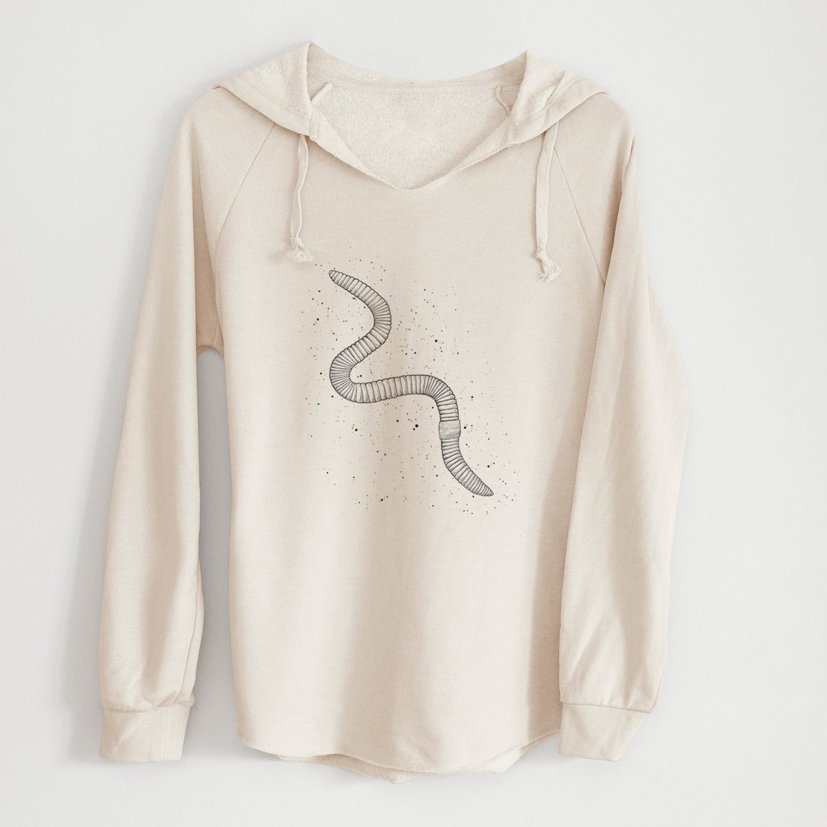 Bone cream women's Cali Wave hooded sweatshirt laid flat, printed with a black ink illustration of a nightcrawler earthworm with soil specks.