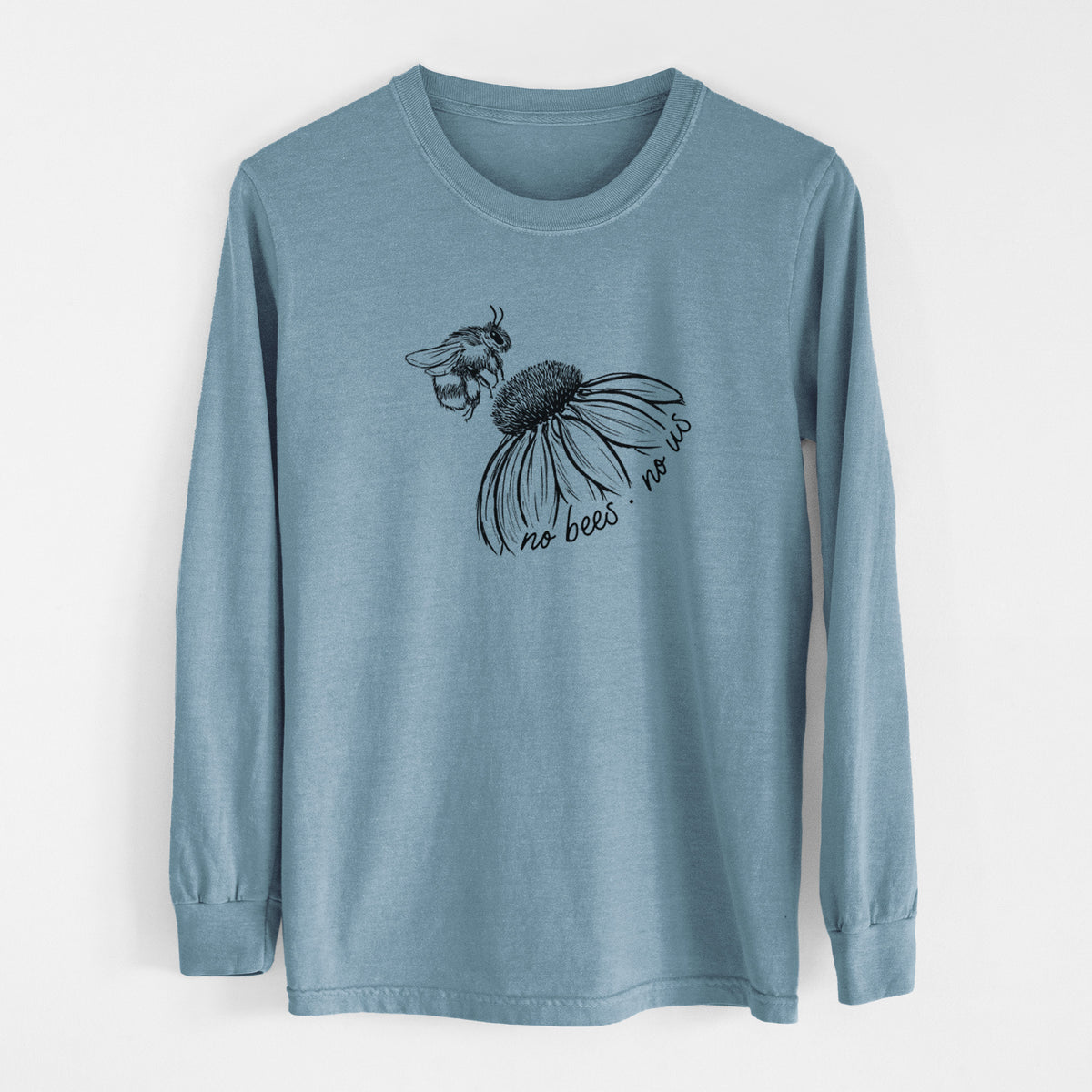 Steel blue Comfort Colors long sleeve shirt laid flat, printed with a black ink illustration of a bee flying toward a coneflower, with the handwritten words no bees no us.