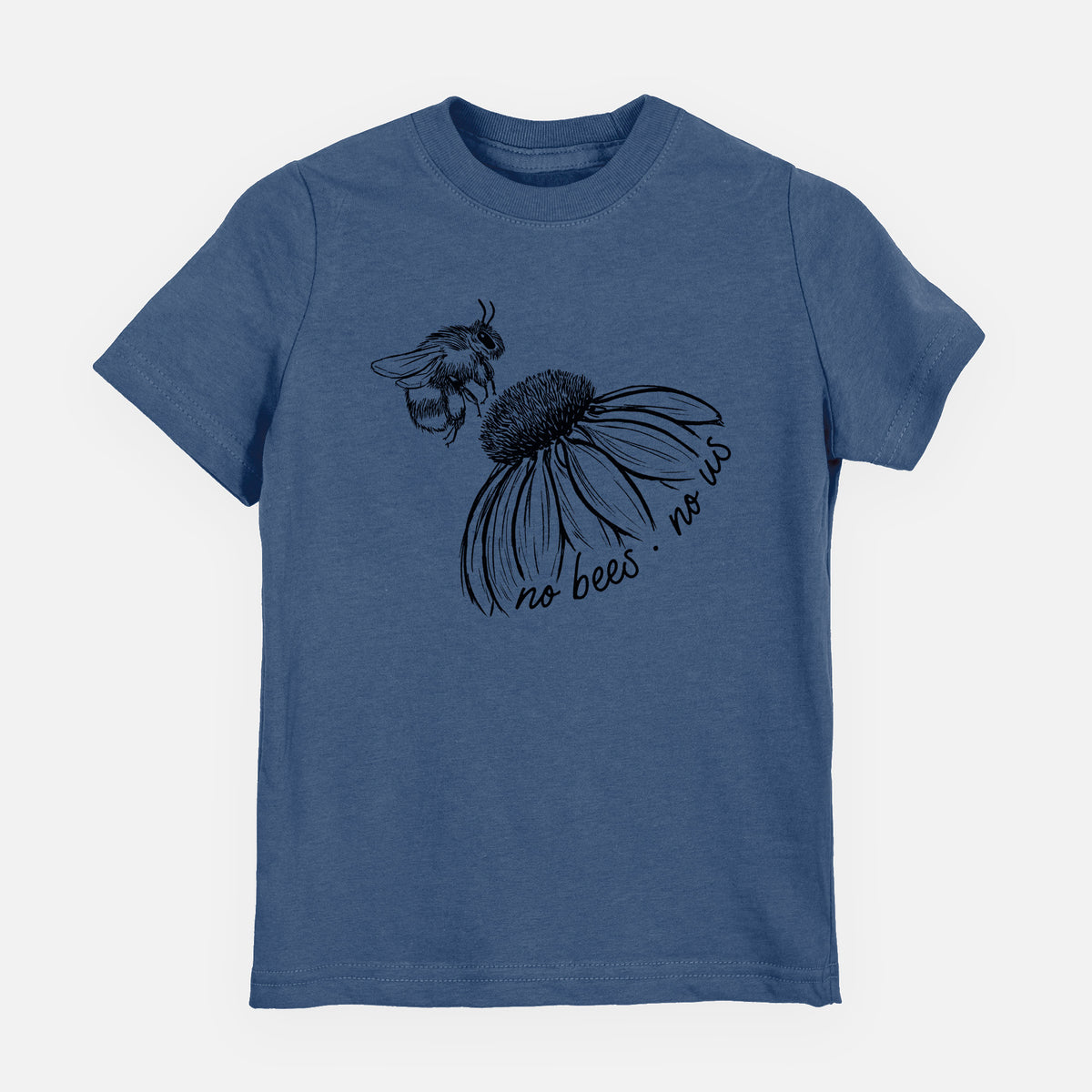 Indigo blue youth t-shirt laid flat, printed with a black ink illustration of a bee flying toward a coneflower, with the handwritten words no bees no us.