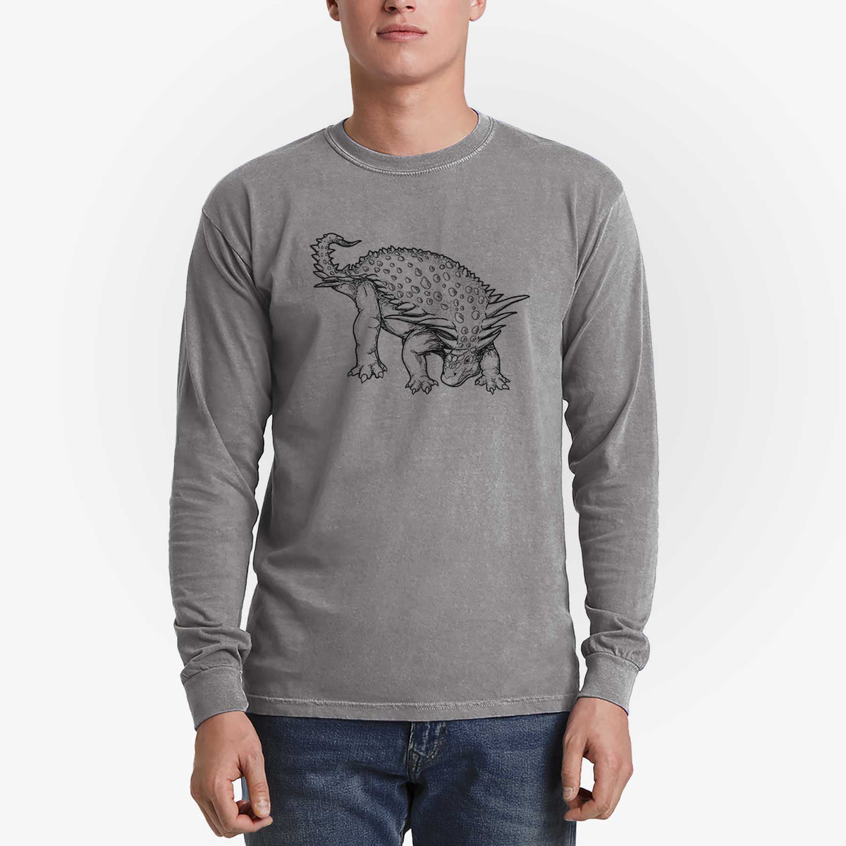 Man wearing a grey Comfort Colors long sleeve shirt printed with a black ink illustration of an armored Nodosaurus.