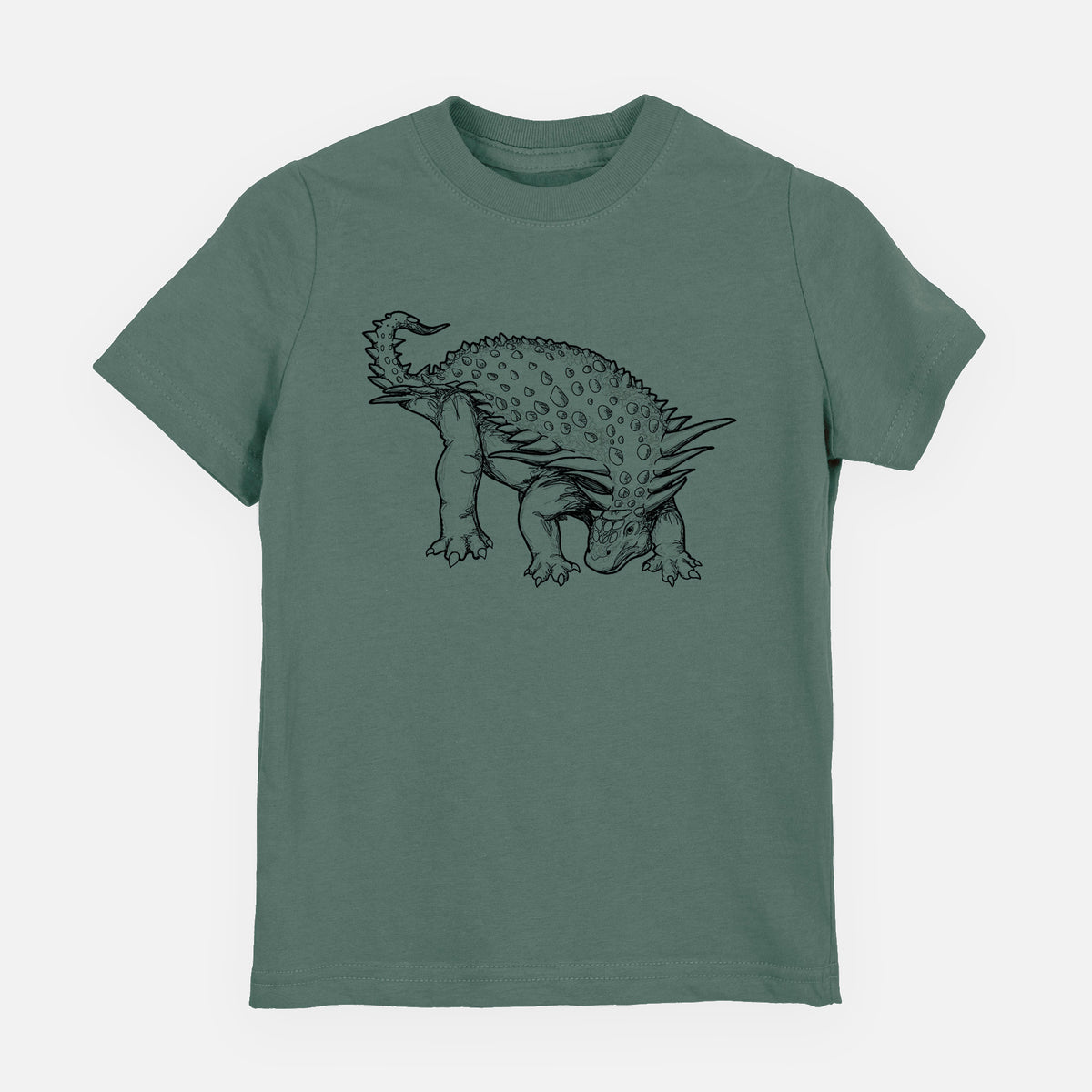 Basil green youth t-shirt laid flat, printed with a black ink illustration of an armored Nodosaurus.