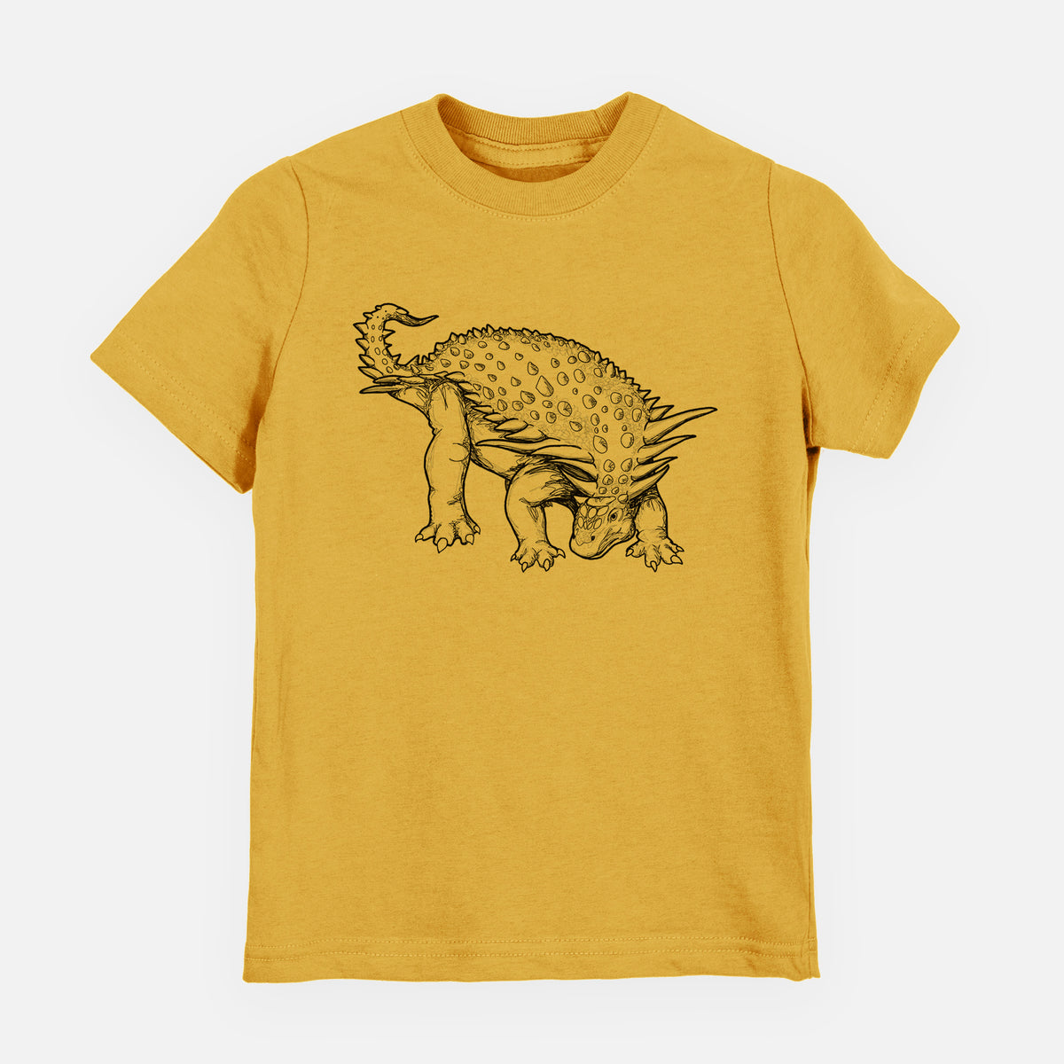 Honeycomb yellow youth t-shirt laid flat, printed with a black ink illustration of an armored Nodosaurus.