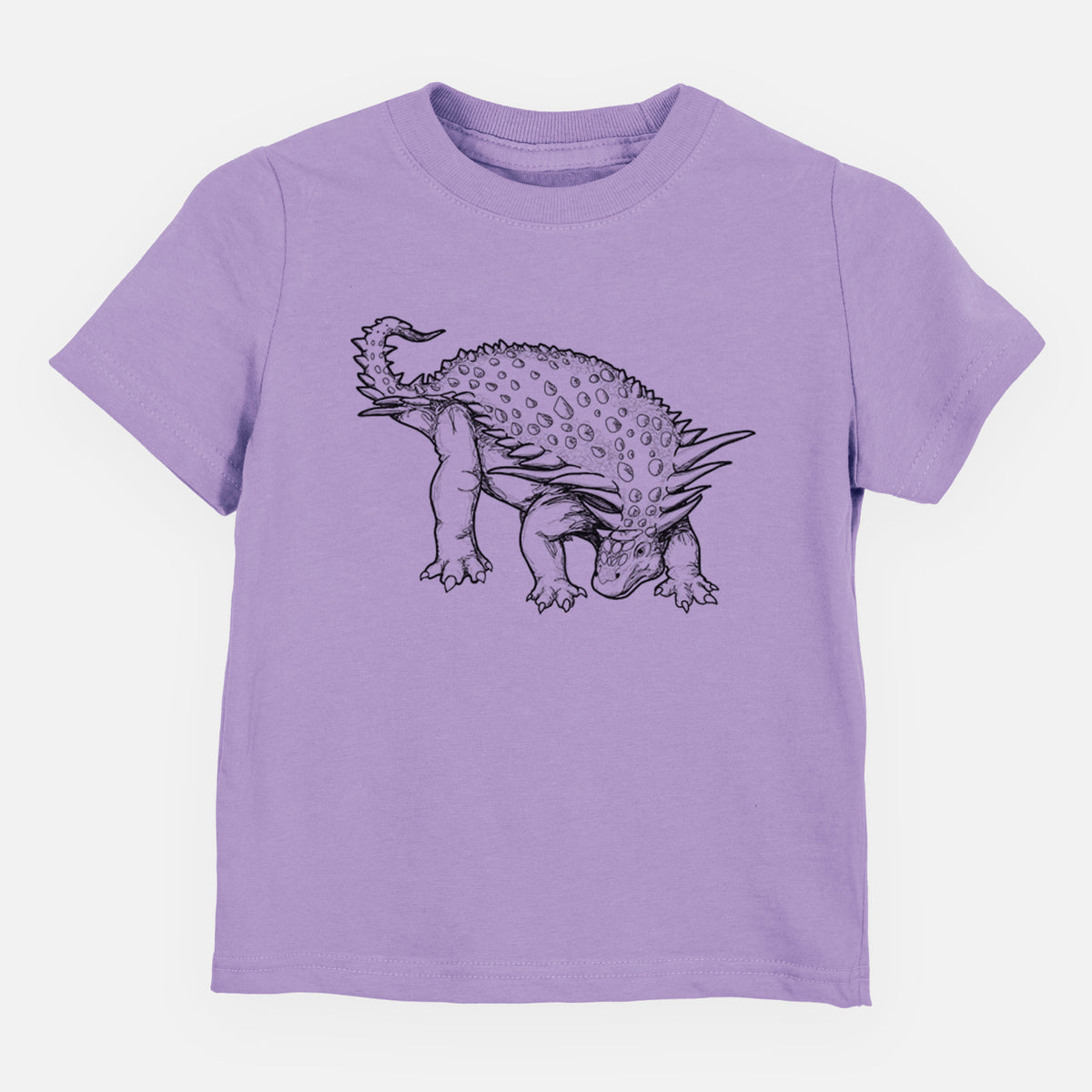 Lavender toddler t-shirt laid flat, printed with a black ink illustration of an armored Nodosaurus.