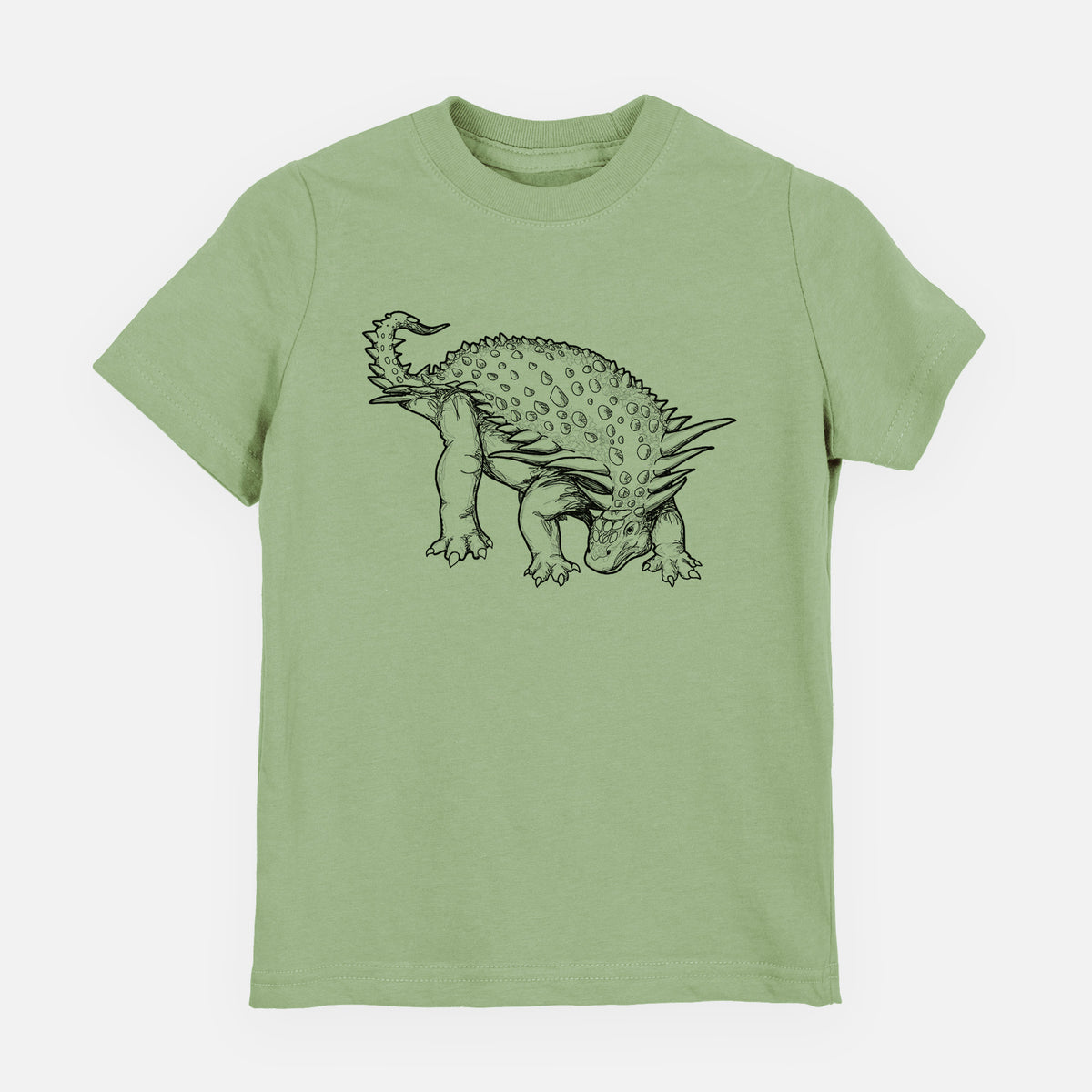 Sage green youth t-shirt laid flat, printed with a black ink illustration of an armored Nodosaurus.