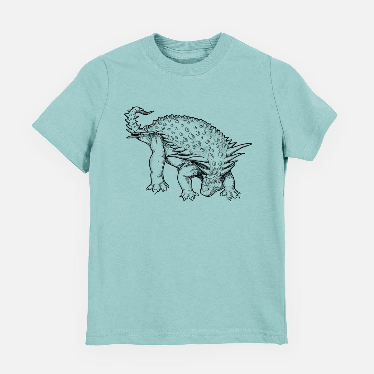 Saltwater youth t-shirt laid flat, printed with a black ink illustration of an armored Nodosaurus.