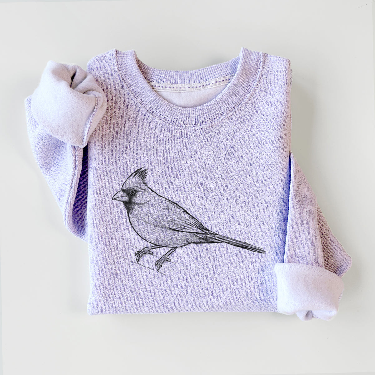 Ice purple knit sweatshirt printed with a detailed black ink sketch of a northern cardinal perched with its crest raised, styled flat.