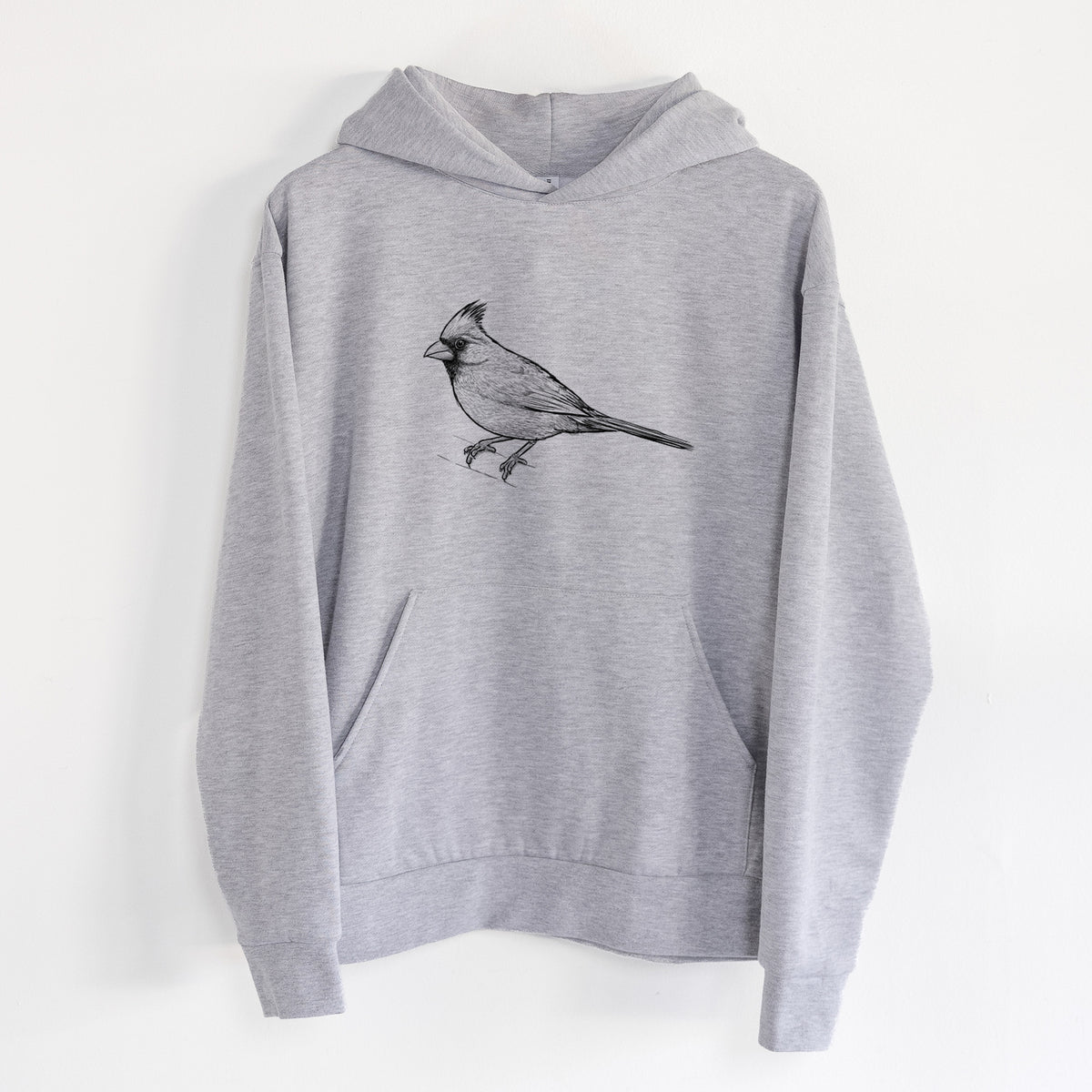 Northern Cardinal - Cardinalis cardinalis - Statement Midweight Hoodie in Heather Grey, hanging on a white wall, with a front kangaroo pocket and no drawcords.