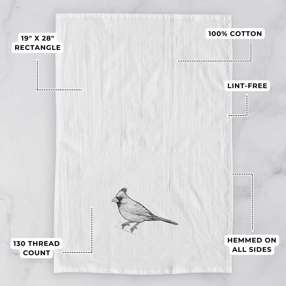White tea towel printed with a detailed black ink sketch of a northern cardinal perched with its crest raised, with feature labels: 19 by 28 inch rectangle, 100% cotton, lint-free, 130 thread count, hemmed on all sides.