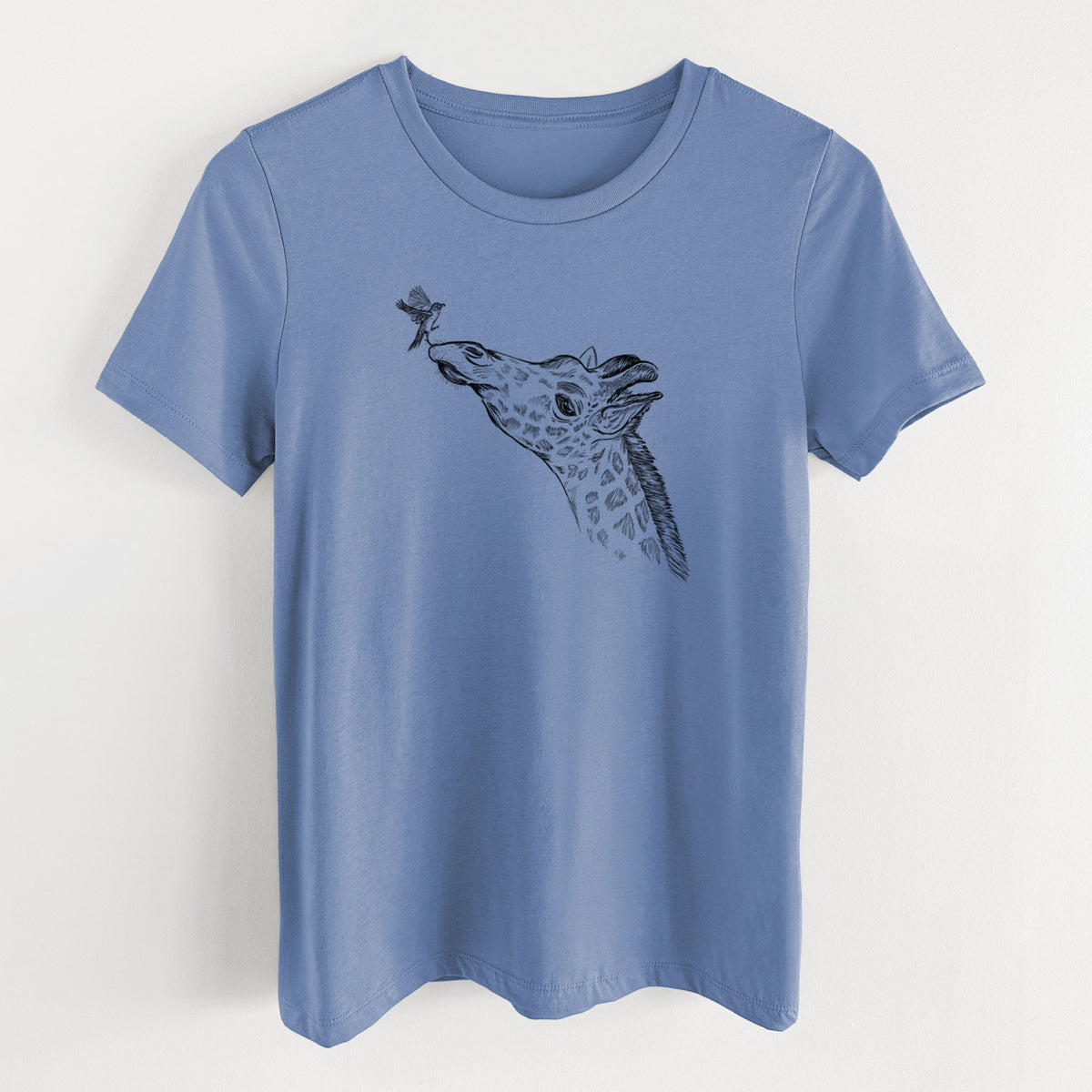 Blue bell women's relaxed fit cotton t-shirt laid flat, printed with a black ink illustration of a northern giraffe reaching its head up to nibble a flower.