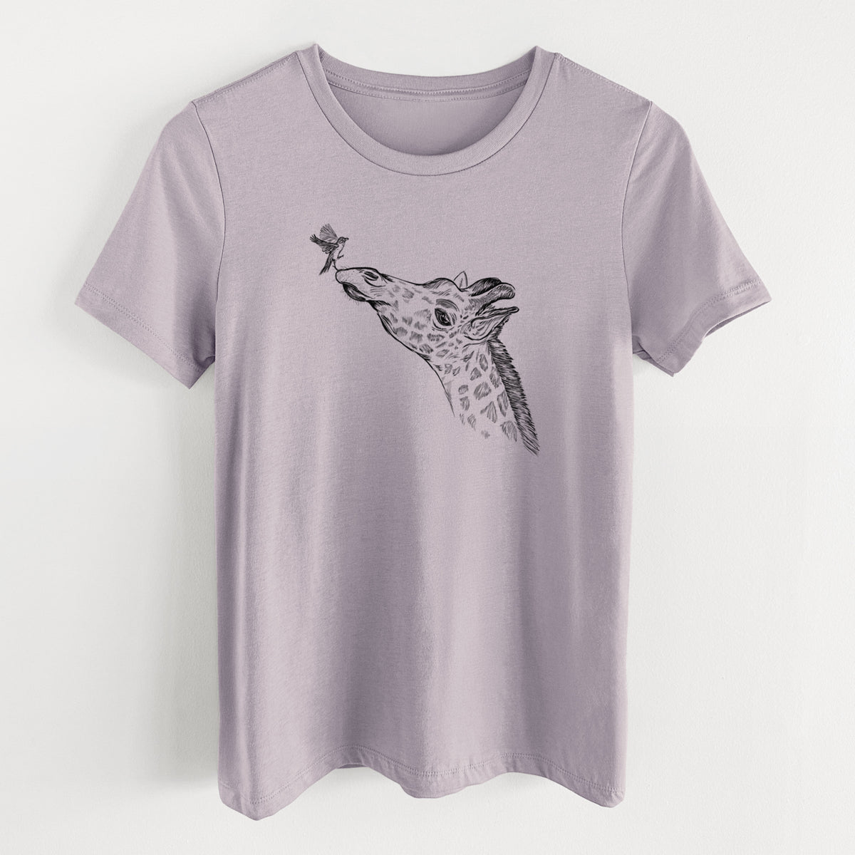 Light violet women's relaxed fit cotton t-shirt laid flat, printed with a black ink illustration of a northern giraffe reaching its head up to nibble a flower.
