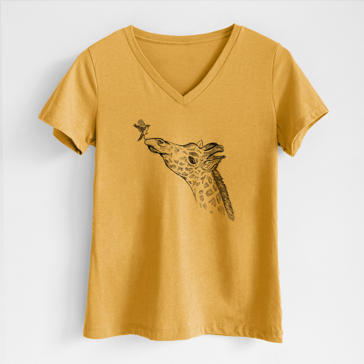 Honeycomb yellow women's relaxed fit cotton V-neck t-shirt laid flat, printed with a black ink illustration of a northern giraffe reaching its head up to nibble a flower.