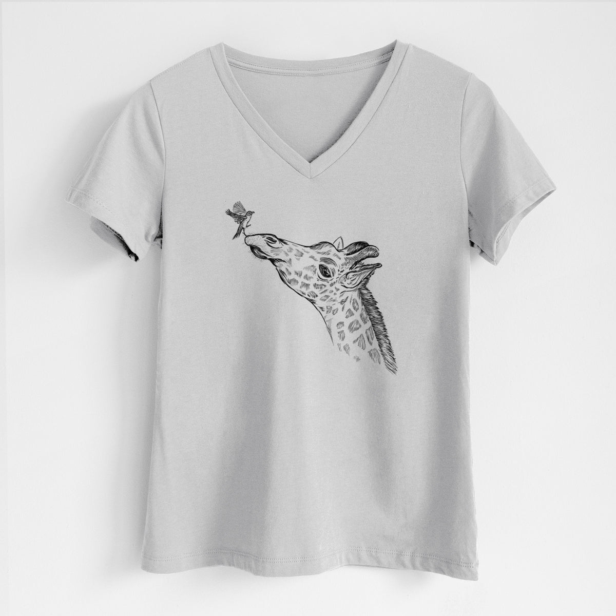 Lunar grey women's relaxed fit cotton V-neck t-shirt laid flat, printed with a black ink illustration of a northern giraffe reaching its head up to nibble a flower.