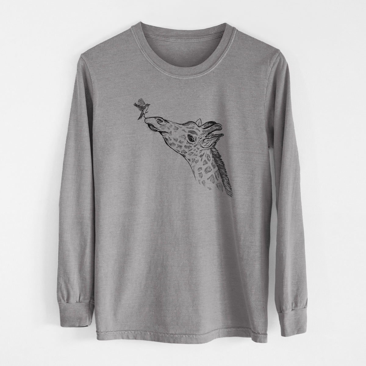 Grey Comfort Colors long sleeve shirt laid flat, printed with a black ink illustration of a northern giraffe reaching its head up to nibble a flower.