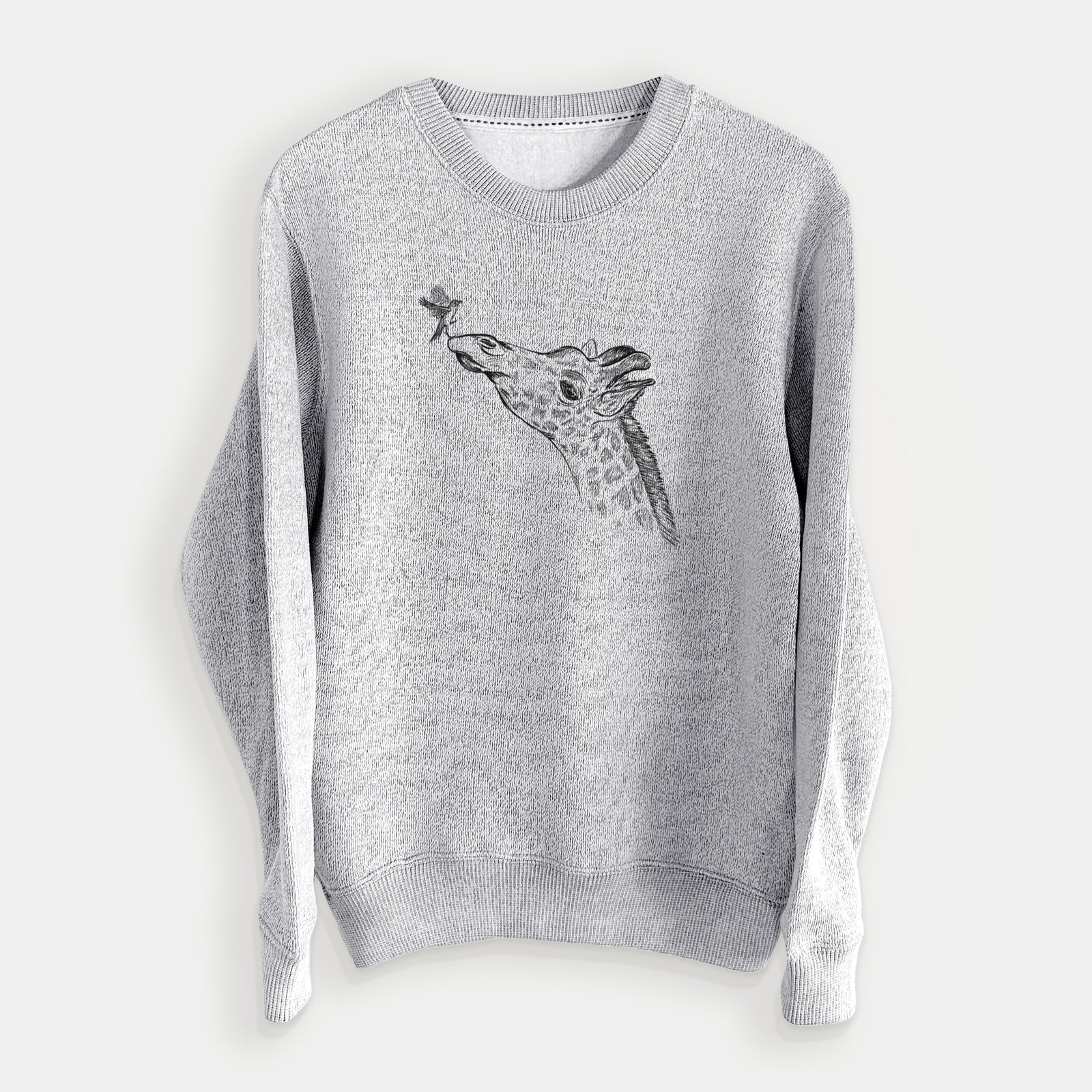 Salt and pepper knit sweatshirt laid flat, printed with a black ink illustration of a northern giraffe reaching its head up to nibble a flower.