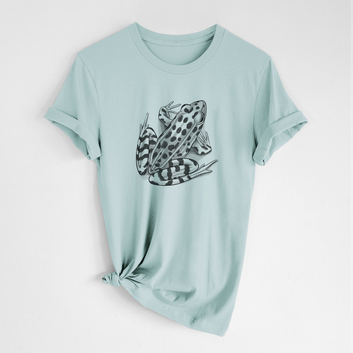 Dusty blue lightweight cotton t-shirt laid flat with the sleeves rolled, printed with a detailed black ink illustration of a spotted northern leopard frog.