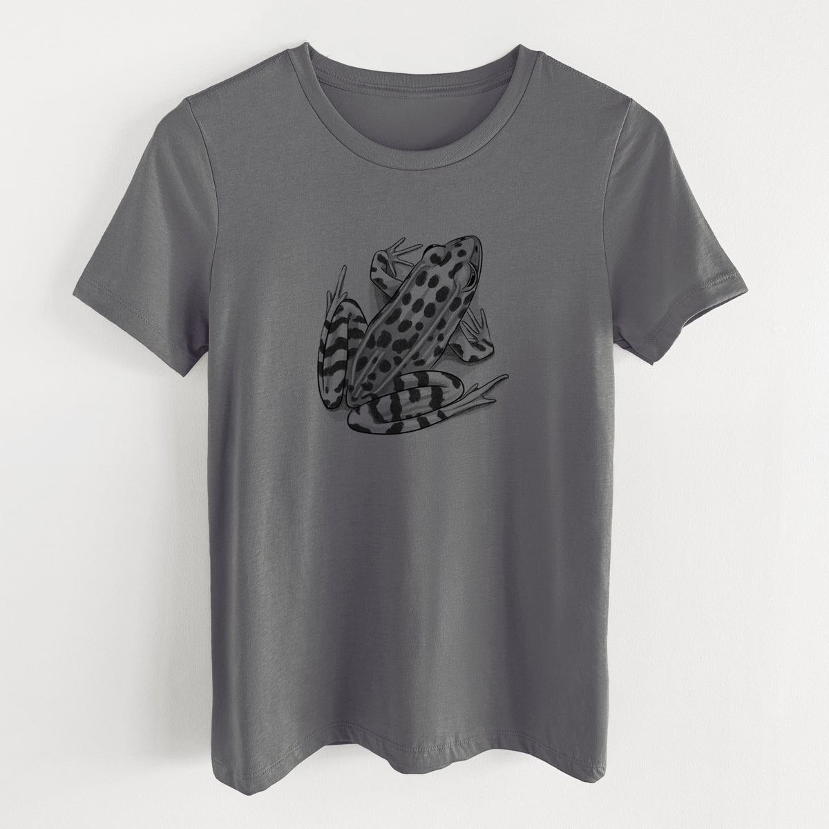 Asphalt women's relaxed fit cotton t-shirt laid flat, printed with a detailed black ink illustration of a spotted northern leopard frog.