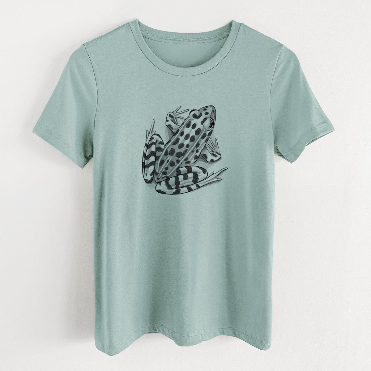 Dusty blue women's relaxed fit cotton t-shirt laid flat, printed with a detailed black ink illustration of a spotted northern leopard frog.