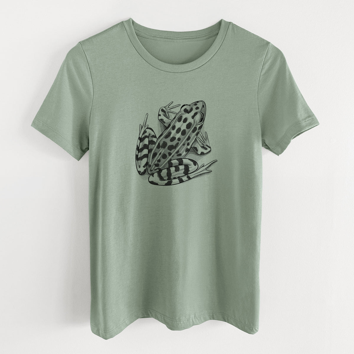 Sage green women's relaxed fit cotton t-shirt laid flat, printed with a detailed black ink illustration of a spotted northern leopard frog.